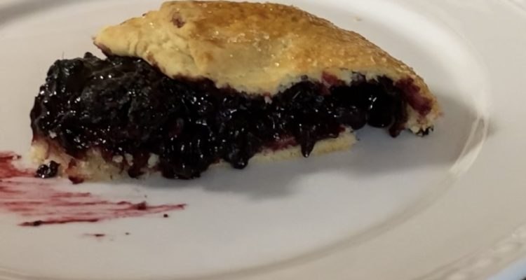 Quick Wild Black Raspberry Sourdough Galette Slice with bite taken out